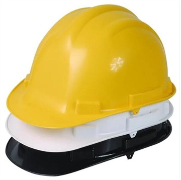 What types of hazards can industrial safety caps protect against