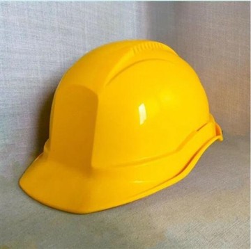 How do you determine the correct suspension for an industrial safety helmet